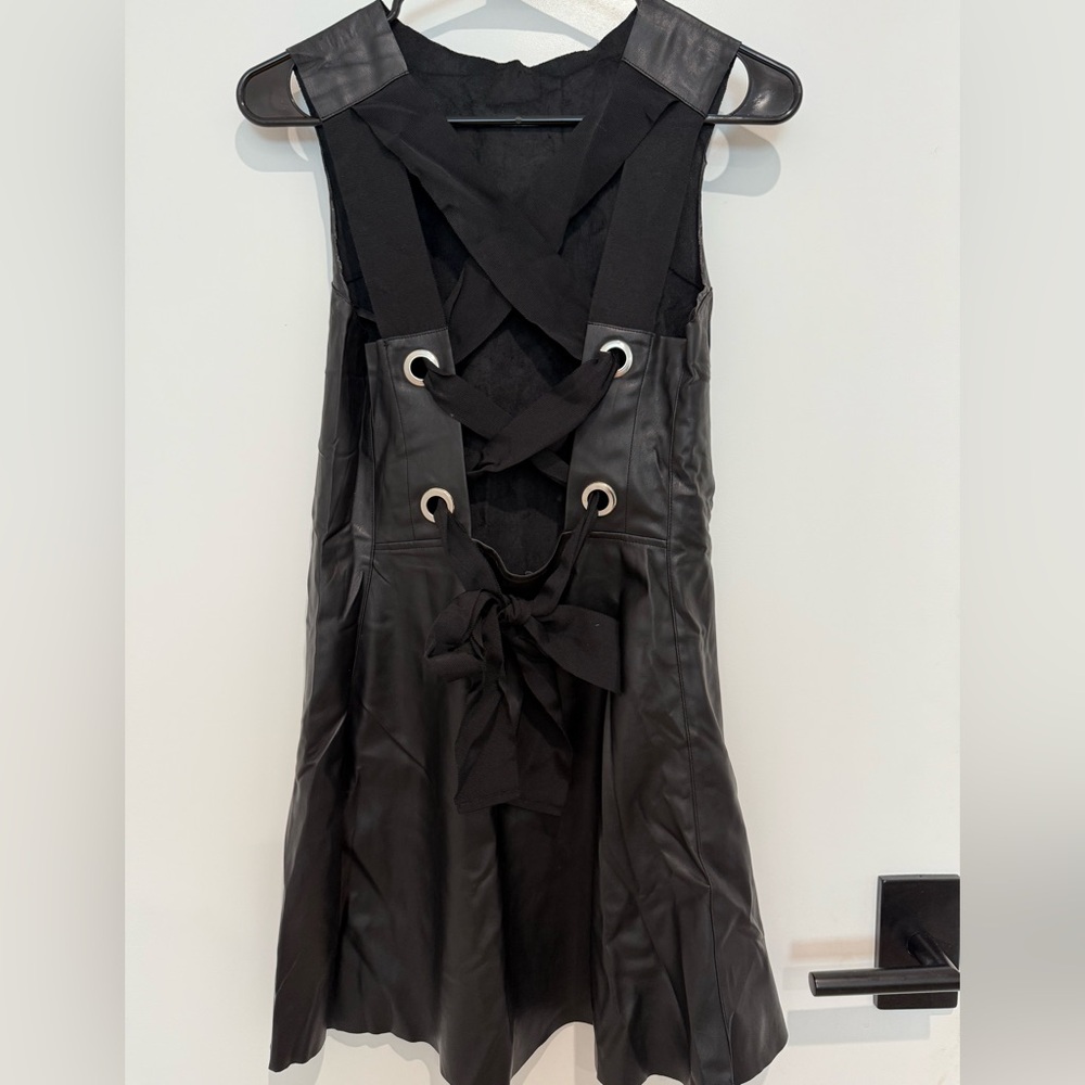 Elegant Black Dress with Lace-Up Detail